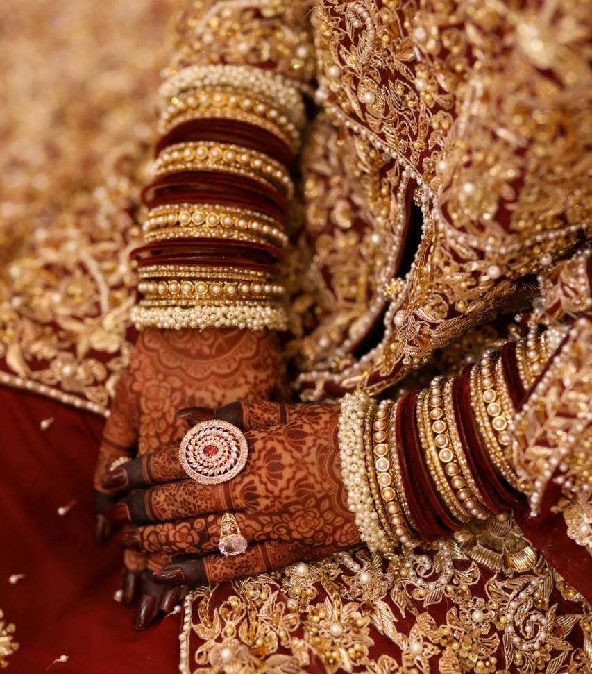 Bridal Mehndi Designs 2026: Elegant Full-Hand & Feet Ideas 5 Heavy back-hand bridal mehndi design on both hands with floral work and deep maroon stained fingertips